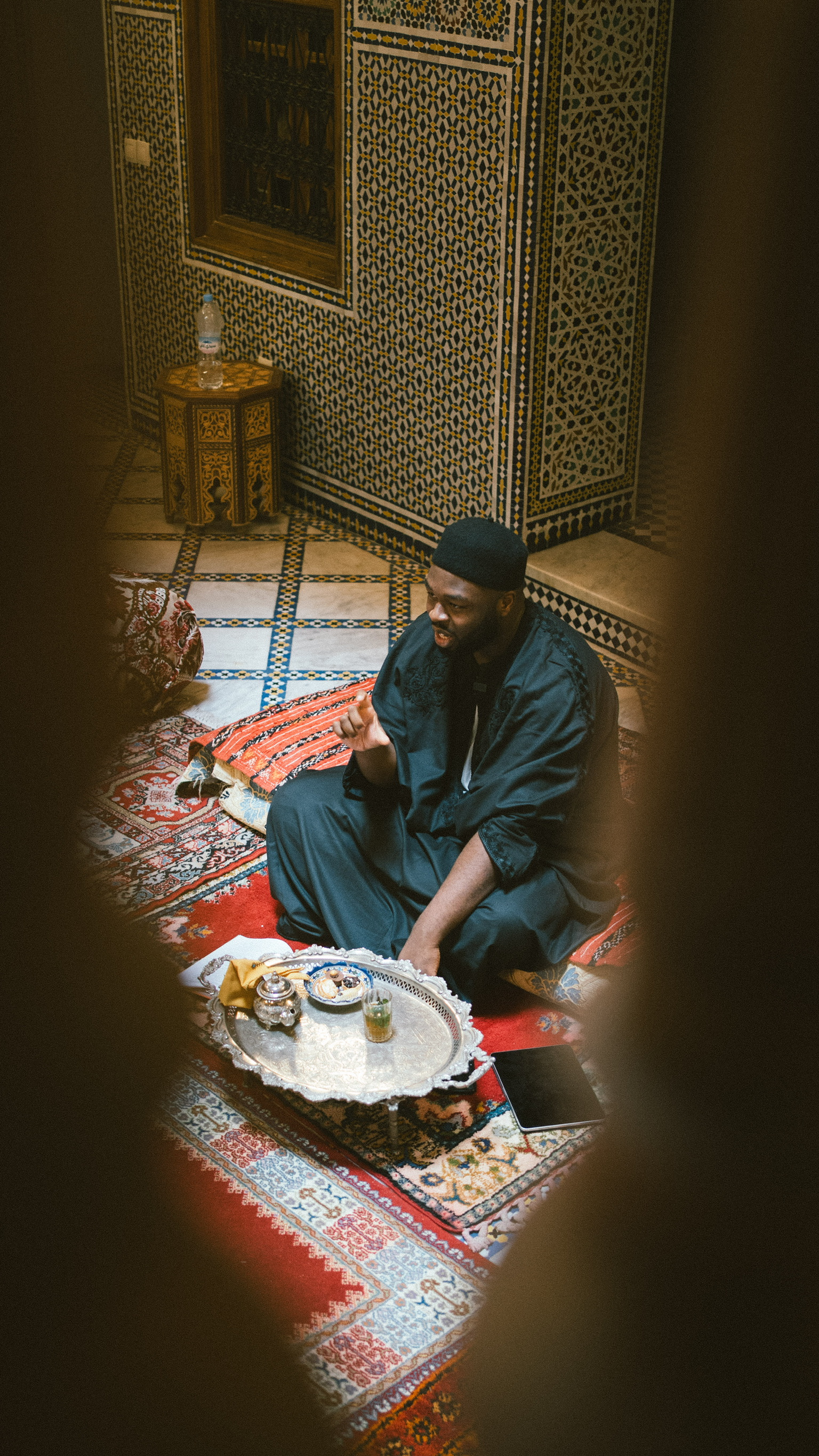 Traditional Islamic setting with prayer and reflection